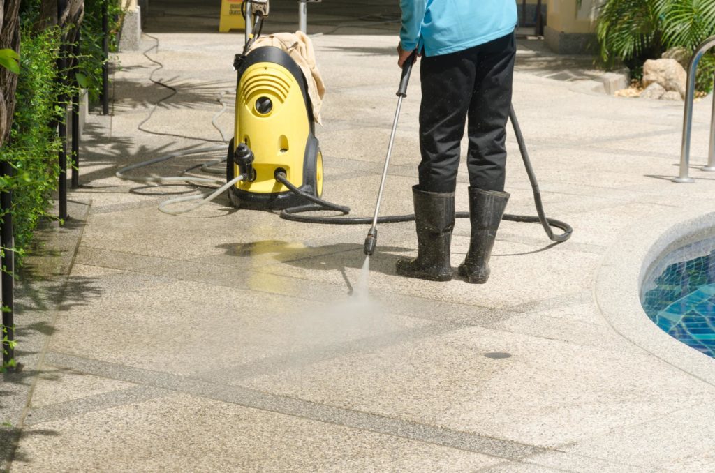 someone cleaning the patio